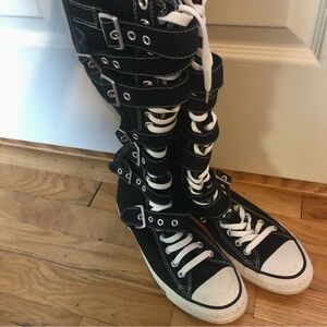 Knee High buckled converse sneakers